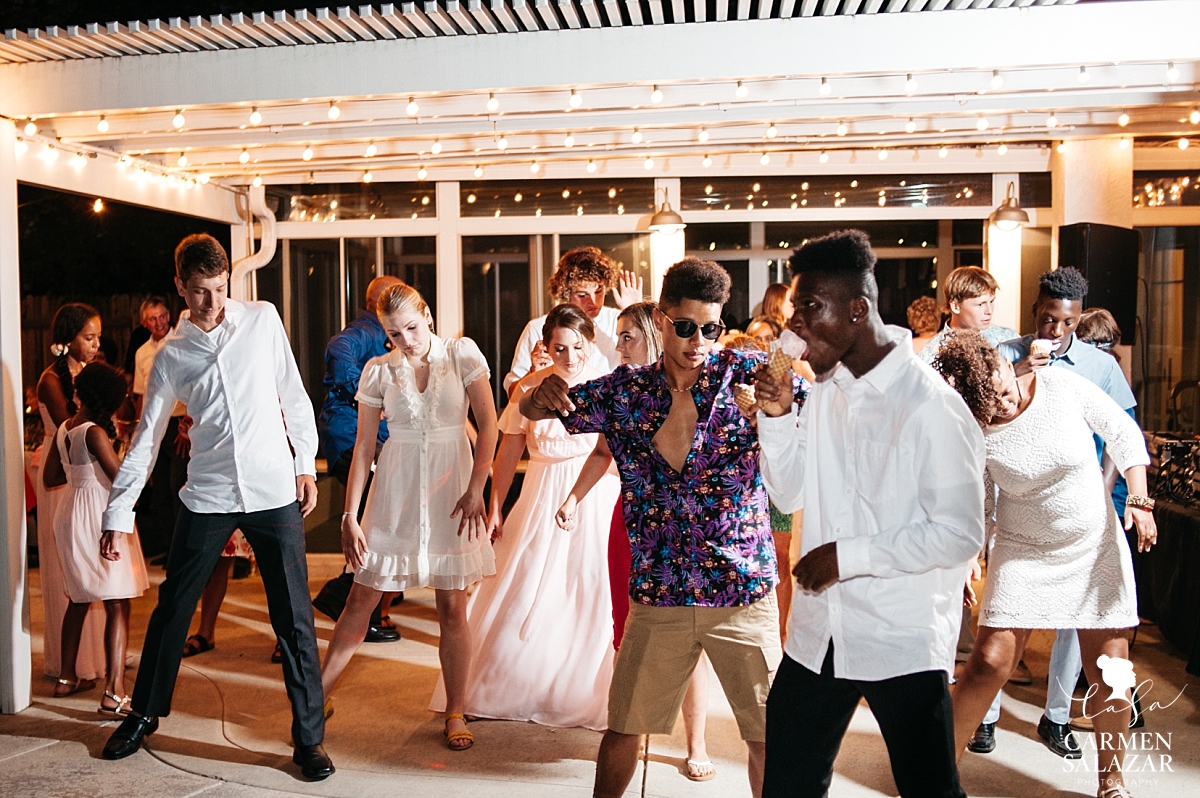 Teenagers tear up the dance floor at reception - Carmen Salazar