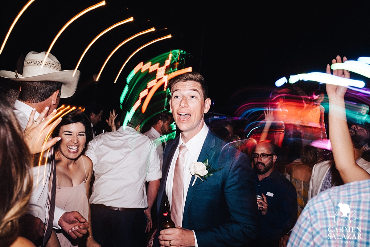 Fun and vibrant groom dancing photos - Carmen Salazar 