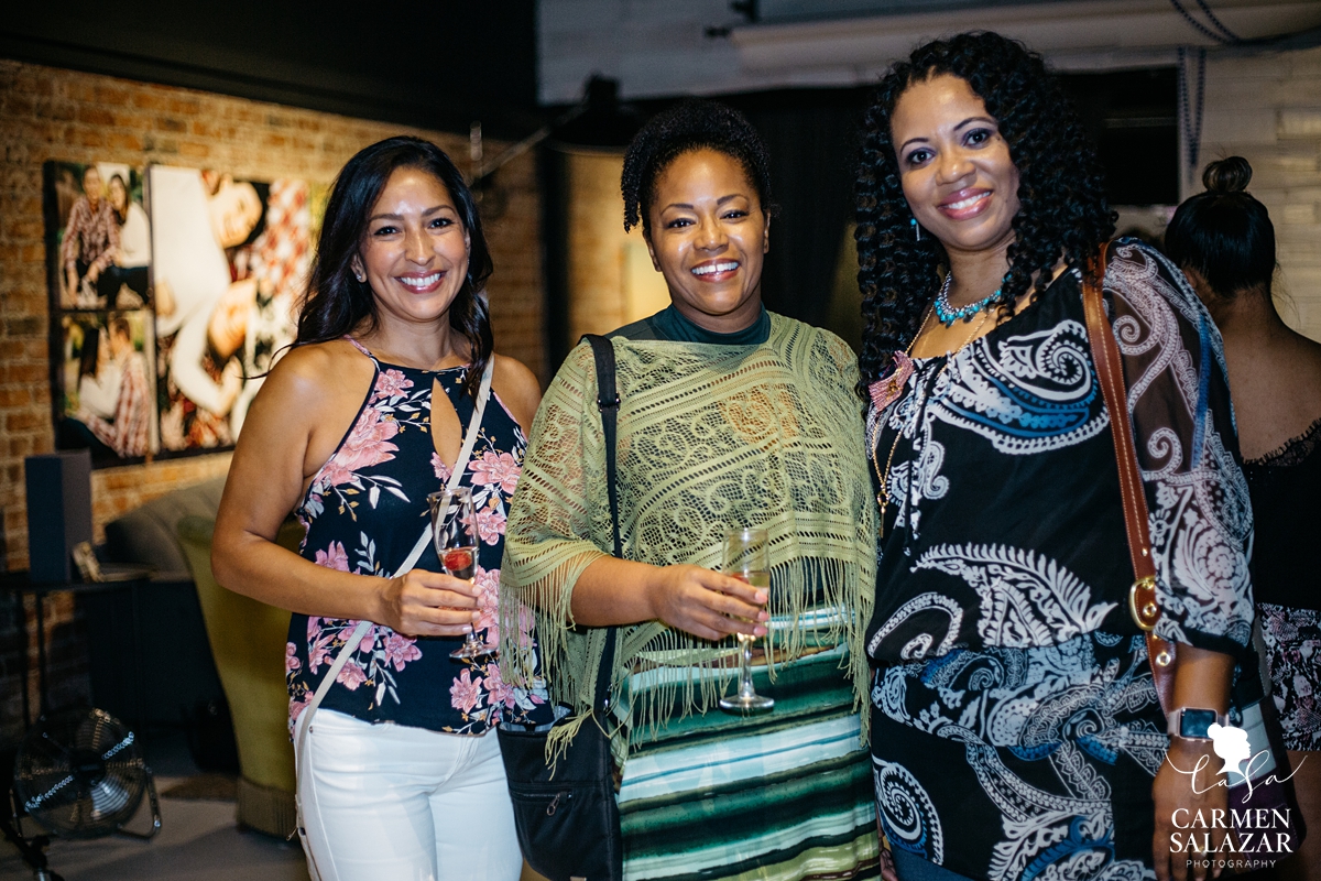 Women gathered at VIP party drinking champagne with Sacramento event photographer Carmen Salazar